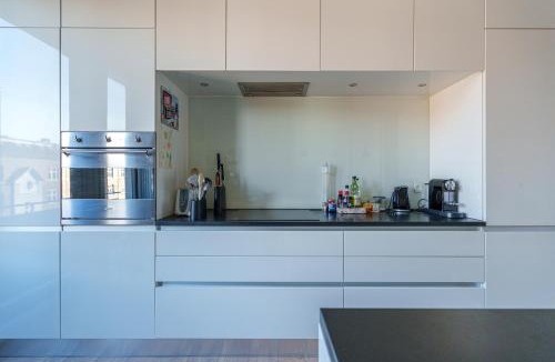 Amager Apartment | Modern Apartment with Balcony near Tivoli & Metro