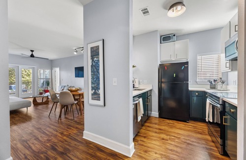 East Riverside - Oltorf Condo | Modern Apartment with Private Patio + Pool, 10 Mins to DT!