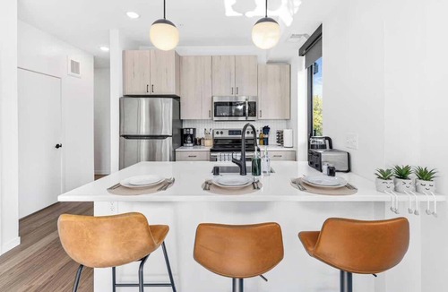 St. Anthony West Apartment | Modern Apt with Rooftop & Skyline Views