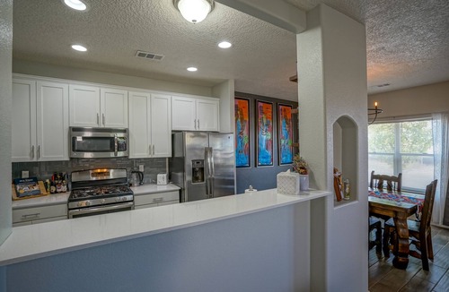 Mesa Del Sol Innovation Park House | Modern Art Filled Dog friendly home w/Grill
