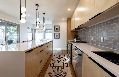 Austin House | Modern Austin Retreat: Chef’s Kitchen, Fireplace & Walkable Prime Location