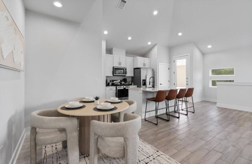 University Hills and Windsor Park Villa | Modern Austin Townhouse with Balcony, Comfy Beds & Reserved Parking
