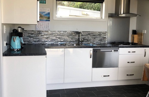 Riverton Cottage | Modern Bach with a Rural view