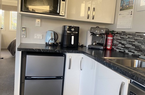 Riverton Cottage | Modern Bach with a Rural view