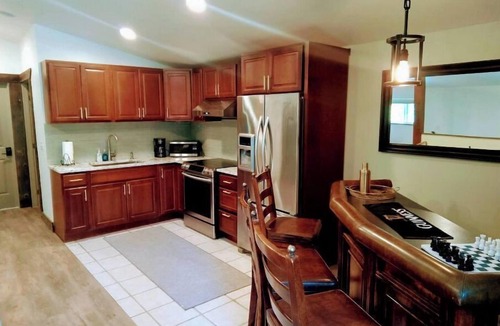 Bow House | Modern Barn Retreat with Private Taproom & Forest Views