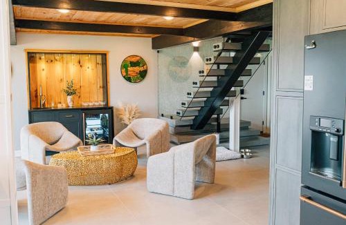 White Stone House | Modern Bayfront Escape with Sweeping Water Views