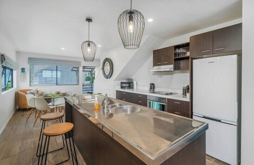 Whitianga Apartment | Modern beach front apartment at Aqua Soleil complex with lap pool & spa.