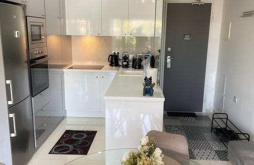 Pueblo Latino Condo | Modern Beach Home + Roof Terrace