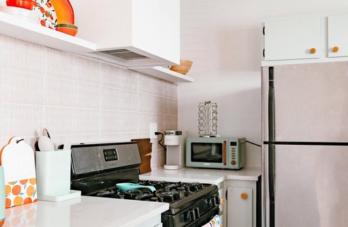 Heights House | Modern Boho Bungalow with Great Walkability to Charm Heights Strip!