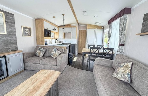 Hopton House | Modern caravan at Caldecott Hall with decking in Norfolk, sleeps 8 ref 91068C