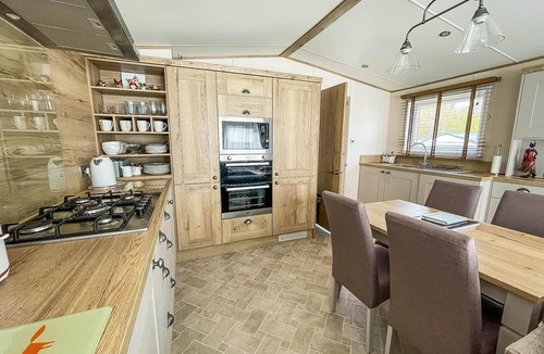 Saxmundham House | Modern caravan with large decking area, ref 60057CH