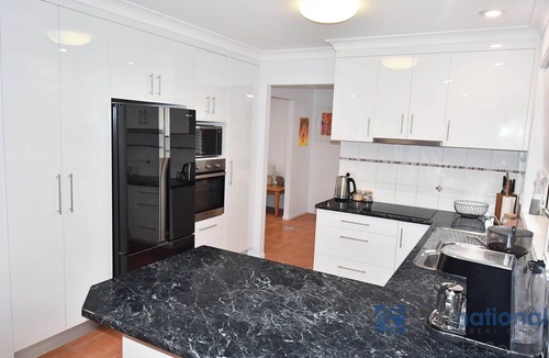 Woodgate House | Modern Comfort with a Pool