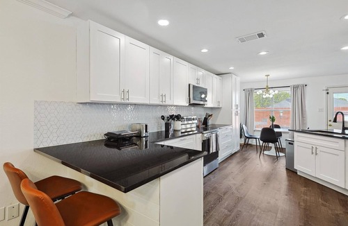 Saginaw House | Modern Comforts & Classic Charm w Pool, 5BD