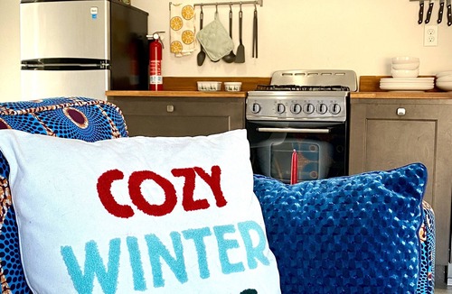 Rumney Cabin | Modern Container House with mountains, river, and privacy.