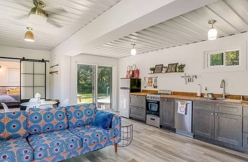 Rumney Cabin | Modern Container House with mountains, river, and privacy.