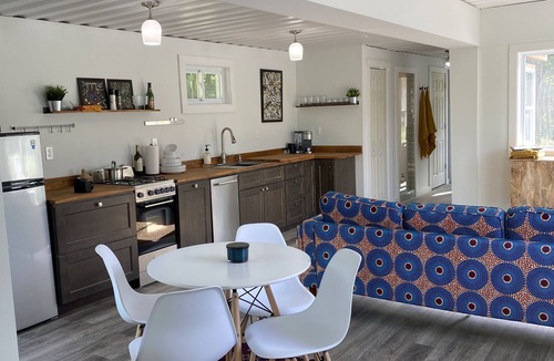 Rumney Cabin | Modern Container House with mountains, river, and privacy.