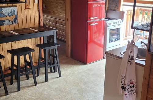 Acadian Peninsula Apartment | Modern Costa Del Sol Flat Overlooking Pokemouche River, with swimming off dock.n