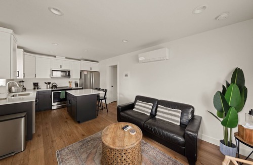 Southern Crossing House | Modern Cottage Steps to Old Mill