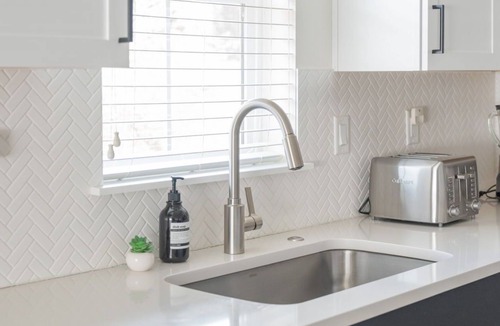 Southern Crossing House | Modern Cottage Steps to Old Mill