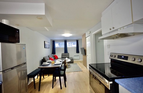 Laval-des-Rapides Apartment | Modern, cozy, 5 min walk to Metro, Place Bell, Free Parking