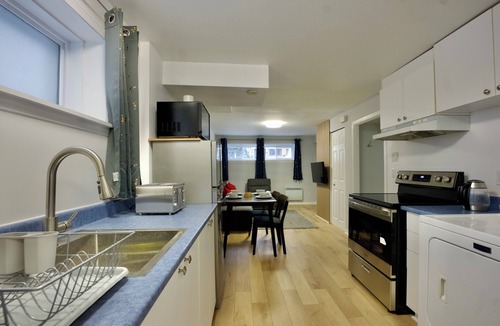 Laval-des-Rapides Apartment | Modern, cozy, 5 min walk to Metro, Place Bell, Free Parking