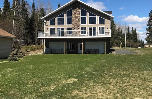Shebandowan Cottage | Modern cozy cottage with beautiful sandy beach on the lake.