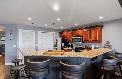 Osage Beach Condo | Modern Decor, Views, Grill, Workstation, Boat + 2 PWC Slips & Resort-style Amenities