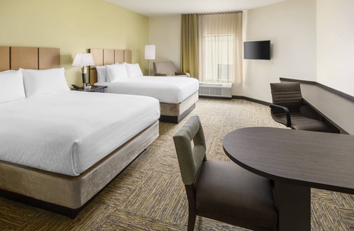 Florida Central Atlantic Coast Hotel | Modern Double Queen Studio | Kitchen & Grill | 3 mi to Typhoon Lagoon