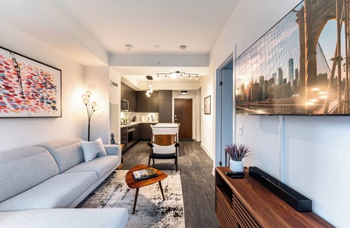 Wellington Place Condo | Modern Downtown Apartment | Workspace + Free Parking