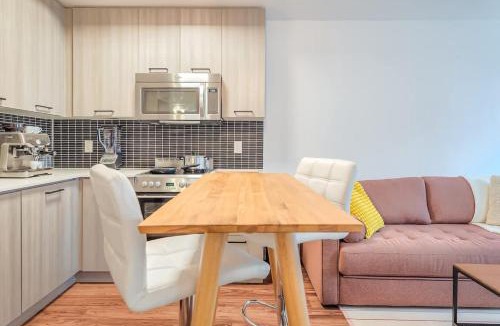 Old Town Apartment | Modern Downtown Condo with Workspace & Balcony