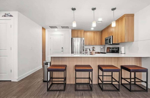 Downtown Salt Lake City Apartment | Modern Downtown 2BR 2BA Near Delta Center with Fire Pit, BBQ, and City Views