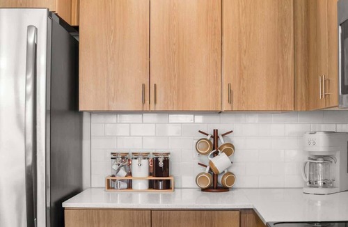 Downtown Salt Lake City Apartment | Modern Downtown 2BR 2BA Near Delta Center with Fire Pit, BBQ, and City Views