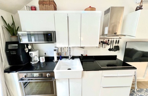 Provincetown Condo | Modern East End Loft - Private Beach, In-Ground Pool Access, & Hot Tub!