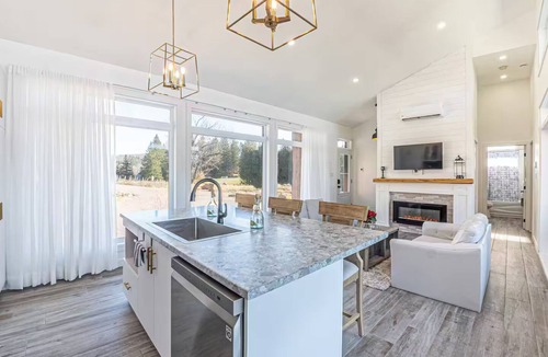 Wentworth-Nord Ski Chalet | Modern elegance and cozy charm! Our Chalet Aura offers tranquil landscape views.
