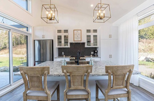 Wentworth-Nord Ski Chalet | Modern elegance and cozy charm! Our Chalet Aura offers tranquil landscape views.