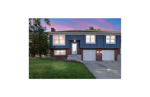 Olathe Apartment | Modern Family Gateway 2-connected duplexes by YDSH GuestMind! Guests enjoy full private access, easy self check in, and dedicated parking.
