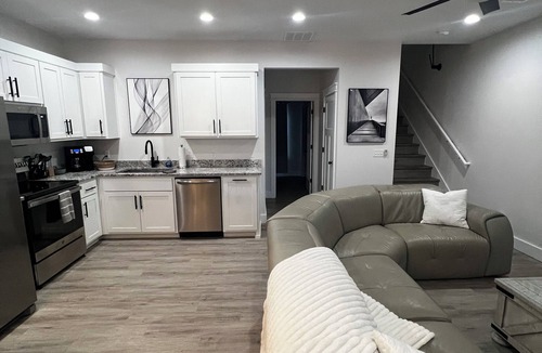 Joplin House | Modern Family Getaway! Heated Pool, Hot tub Theatre Room, Game room!