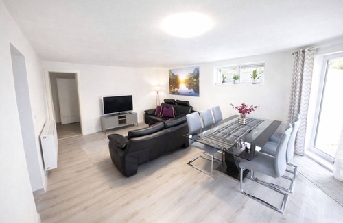 Busserach Apartment | Modern Family Home with Garden & Sunset Views near Basel