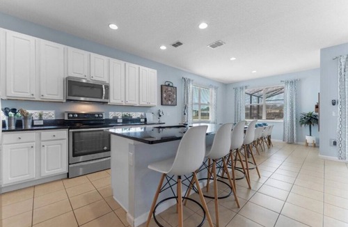 Kissimmee Villa | Modern Family Retreat Near Disney with Pool & Jacuzzi