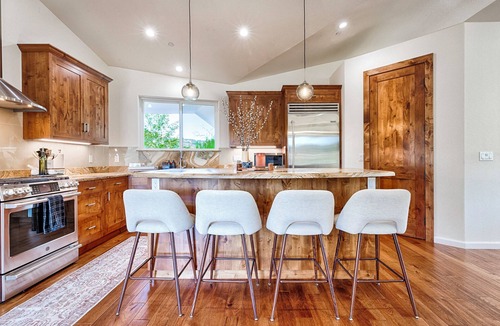 Riebli-Wallace Neighborhood Group House | Modern Farmhouse with Pool & Vineyard