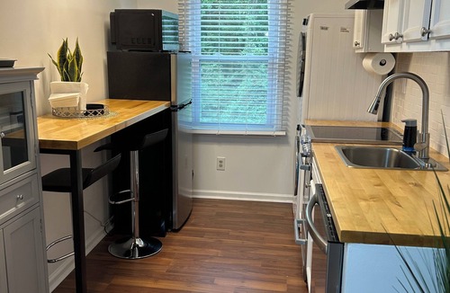 Fayetteville Apartment | Modern, fully equipped studio with separate sleeping area. 2 guests max.