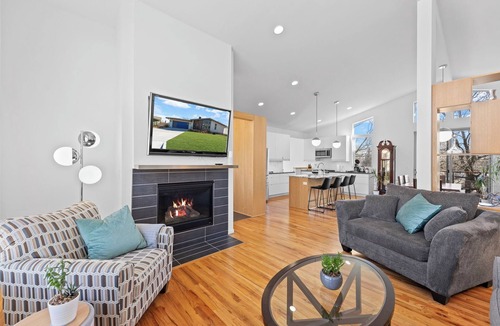 Riverside House | Modern Gem with Secret Room, Game Room, Fire Pit, & Hot Tub Best for Relaxation