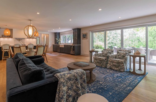 Owen Sound House | Modern Green Oasis in private setting, covered patio with hot tub and fire pit!