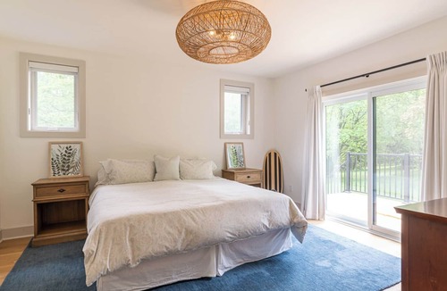Owen Sound House | Modern Green Oasis in private setting, covered patio with hot tub and fire pit!