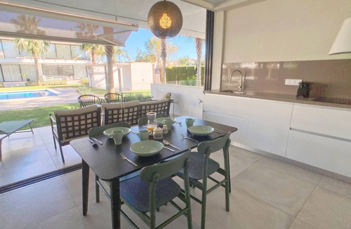 Mar de Cristal Apartment | Modern Ground Floor Apartment in Islas Menores with Community Pool and Garden