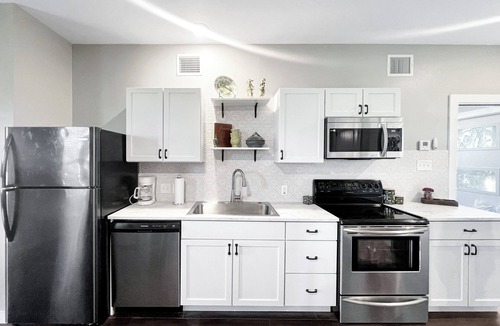 Five Points House | Modern Historic Downtown Apartment