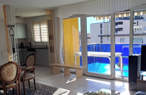 Minusio Apartment | Modern holiday apartment with panoramic lake and mountain views in Minusio