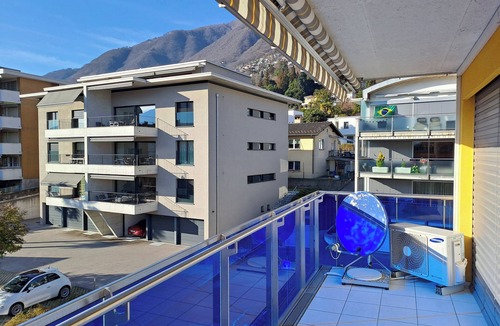 Minusio Apartment | Modern holiday apartment with panoramic lake and mountain views in Minusio