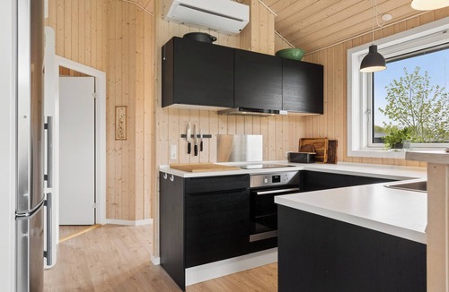 Haarby House | Modern holiday home near beach and nature Helnaes