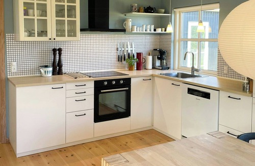 Grena Strand House | Modern holiday home with spa at Grenaa Beach